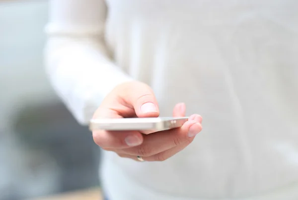 Close up of a woman using mobile smart phone — Stock Photo, Image