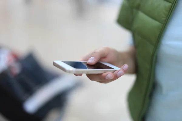 Close up of a woman using mobile smart phone — Stock Photo, Image
