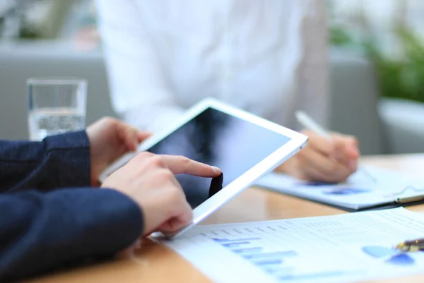 Business adviser analyzing financial figures — Stock Photo, Image