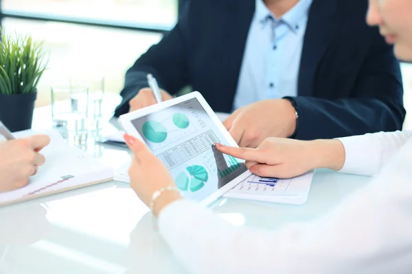 Business person analyzing financial statistics — Stock Photo, Image