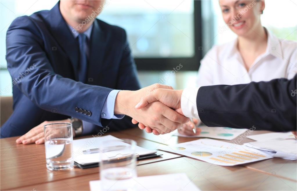 Business people shaking hands