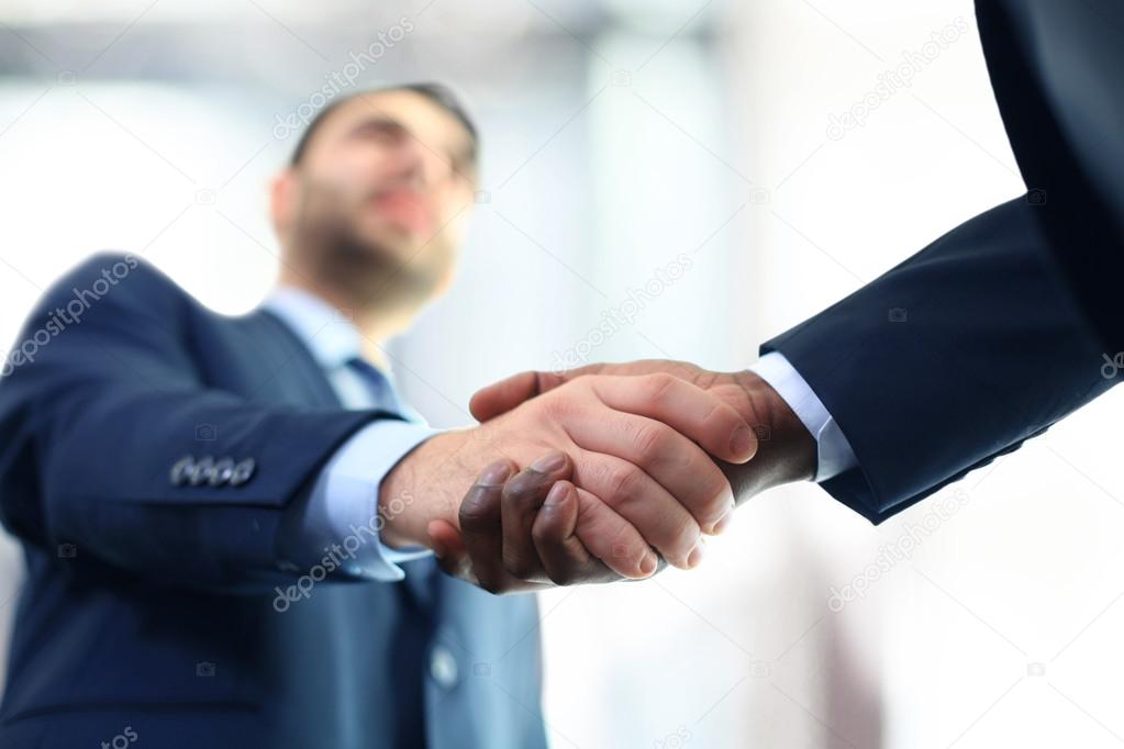 Business man giving a handshake