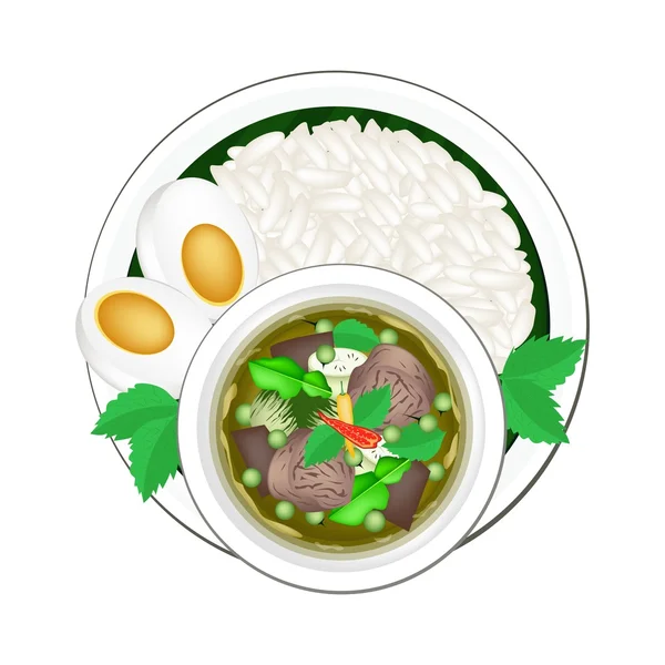 Curry verde tailandés con arroz de jazmín cocido — Vector de stock