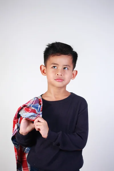 Азиатский мальчик, мечтающий — стоковое фото