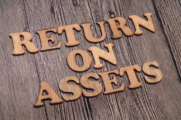 Return Assets Roa Tekstwoorden Typografie Geschreven Houten Achtergrond Leven Zakelijke — Stockfoto