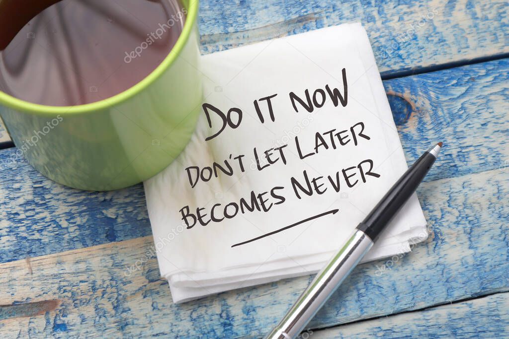 Do it now, text words typography written on paper against wooden background, life and business motivational inspirational concept