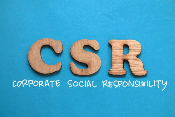Csr企業の社会的責任 青い背景に書かれた文字のタイポグラフィ 人生とビジネスのモチベーションに満ちたコンセプト — ストック写真