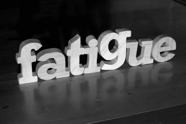 Fatigue Text Words Typography Written Wooden Letter Black Background Life — Stock Photo, Image