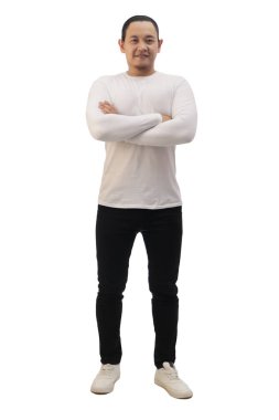Asian man wearing grey shirt black denim and white shoes, standing with crossed arms, happy confidence expression. Full body portrait isolated cut out