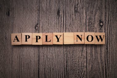 Apply Now, text words typography written with wooden letter, life and business motivational inspirational concept