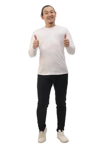 Szczęśliwy Uśmiechnięty Azjata Białej Koszuli Czarnych Dżinsach Patrząc Aparat Pokazuje — Zdjęcie stockowe