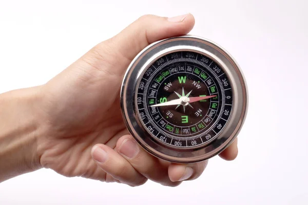 Close Hand Holding Magnetic Silver Metal Compass White Background — Stock Photo, Image