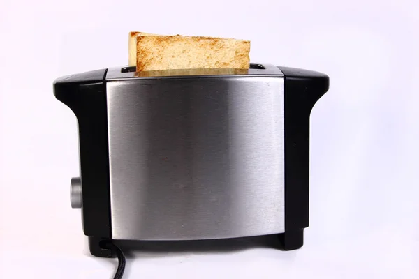 Toast im Toaster — Stockfoto