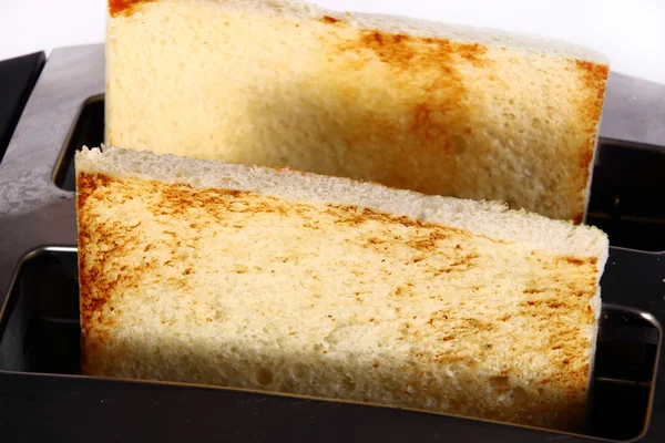 Toast im Toaster — Stockfoto