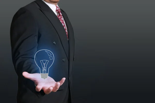 Affärsman och idé Bulb lampa — Stockfoto