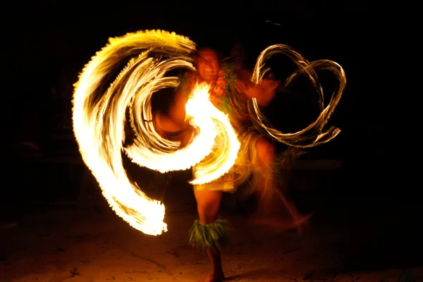 Fire show in famous Hina cave, blurred motion, Oholei beach, Ton Stock Image