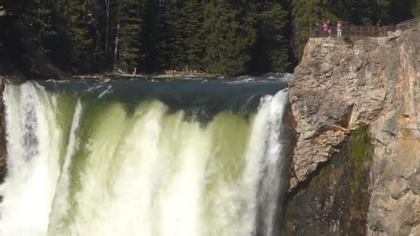 Closeup of Lower Falls with people on a viewing platform in Yellowstone National Park, Wyoming, USA — Stock Video