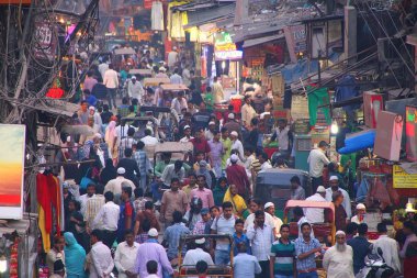 View of Chawri Bazar full of people in the evening from Jama Mas clipart