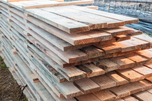 Wooden planks hammered into formwork panels for construction, neatly folded. — Stock Image Wooden Planks Hammered Formwork Panels Construction Neatly Folded Royalty Free Stock Photos