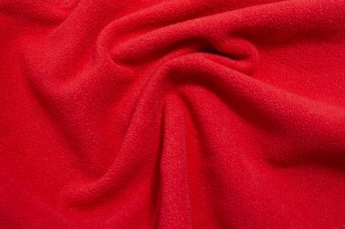 kırmızı kumaş dokusu arkaplanı bir dalga şeklinde, kopyalama alanı ile yatar