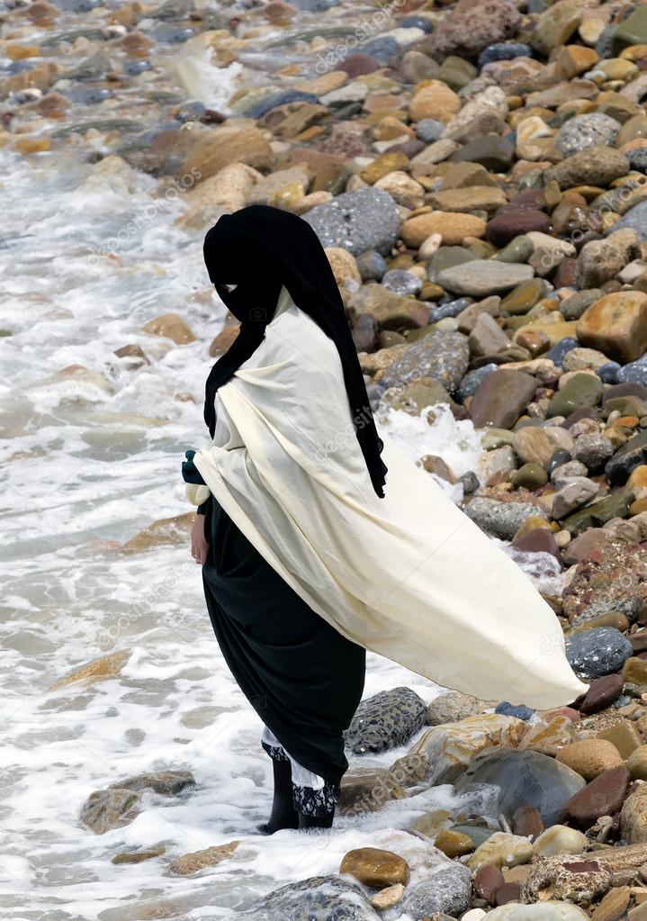 Traditional clothed muslim woman