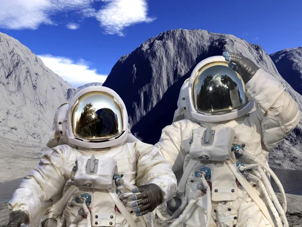 astronotların üzerinde kayalık bir manzara