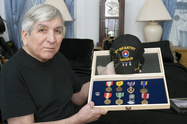 Vietnam vet show his medals earned during service — Stock Photo, Image