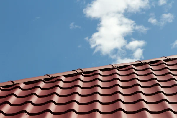 Roof covered with metal tile Royalty Free Stock Photos