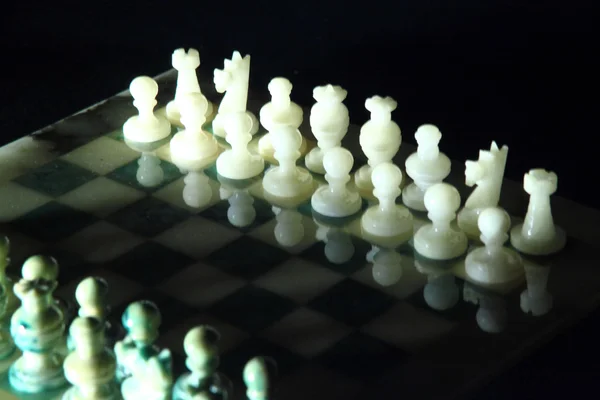 Chessboard and alabaster chess n — Stock Photo, Image