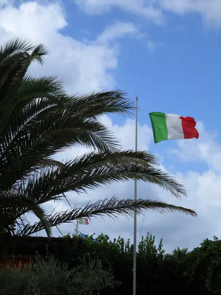 Italian flag flying a — Stock Photo, Image