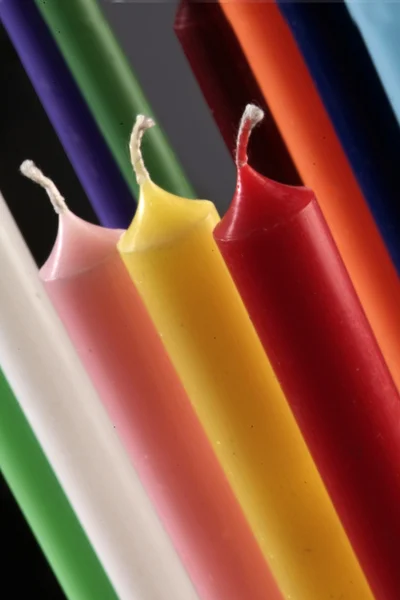 Group of colorful cylindrical candles o — Stock Photo, Image