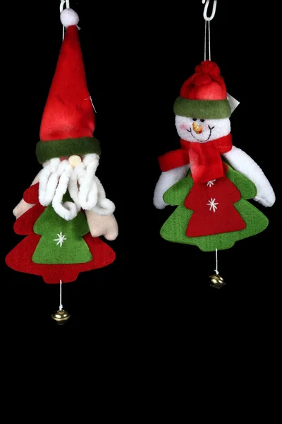 Christmas decorations to hang on black f — Stock Photo, Image