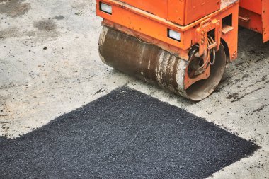 turuncu paten asfalt kaldırım makinası tamir çukurları