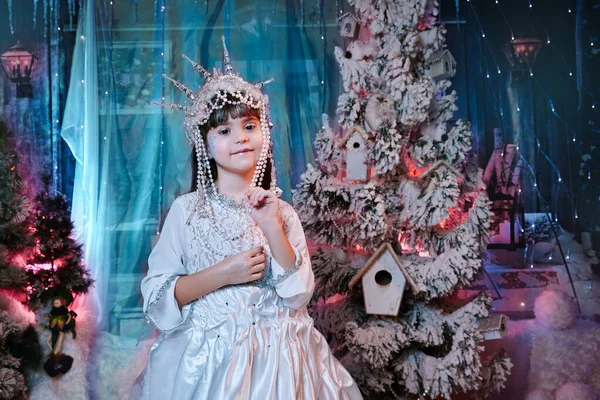 portrait of the child of the snow queen in the crown. fairy tale concept