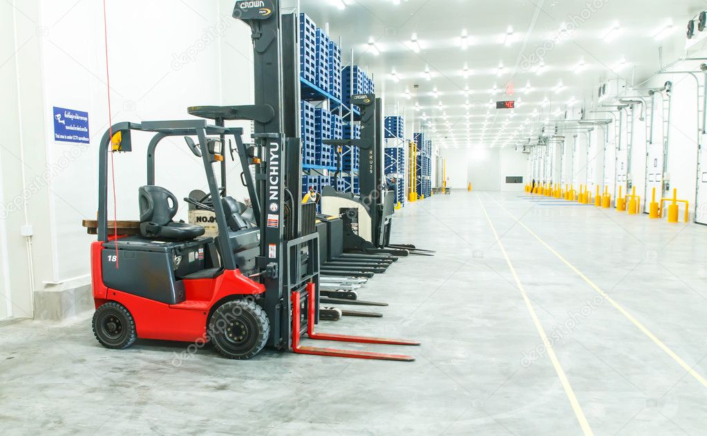 Large warehouse with forklifts