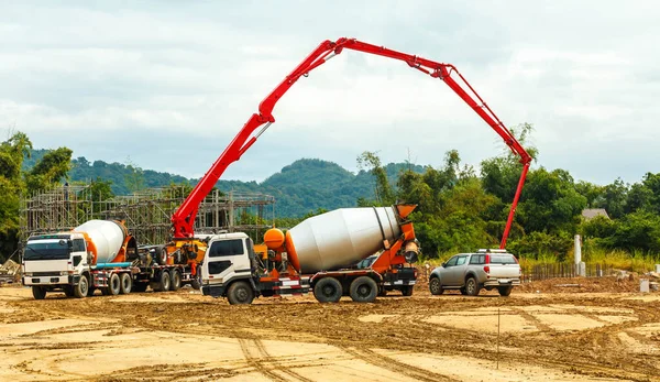 construction building works with concrete pump