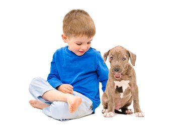 Kid sitting with a puppy clipart