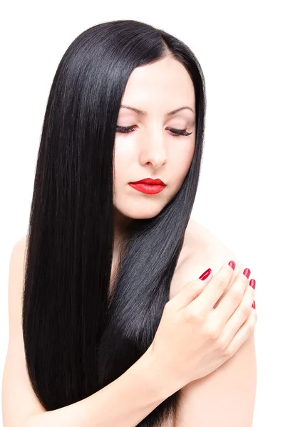 Portrait of a beautiful young woman with groomed long hair — Stock Photo, Image