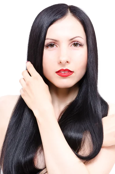 Uzun bakımlı saçlı güzel bir genç kadın portresi — Stok fotoğraf