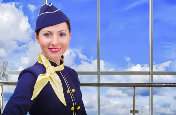 Portrait of smiling stewardess at the airport — Stock Photo, Image