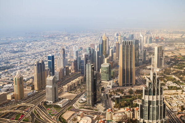 Dubai, UAE. Panoramic view of Dubai skyline from above. Dubai downtown from Burj Khalifa tower skyscraper