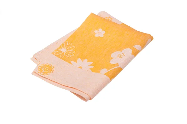 Желтое кухонное полотенце или салфетка изолированы на белом — стоковое фото