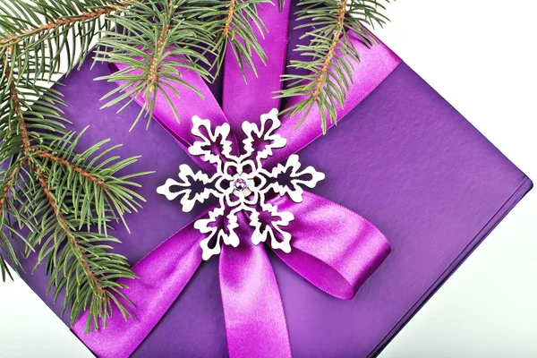 Top view of purple present box with decoration — Stock Photo, Image