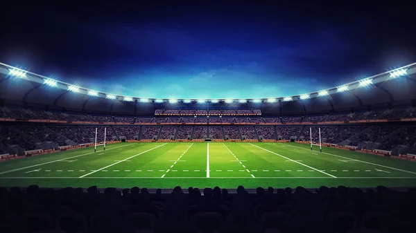 Estádio de rugby moderno iluminado com espectadores e grama verde — Fotografia de Stock