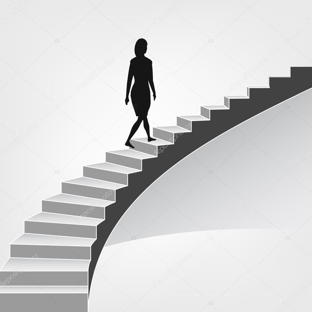 woman walking up on spiral staircase