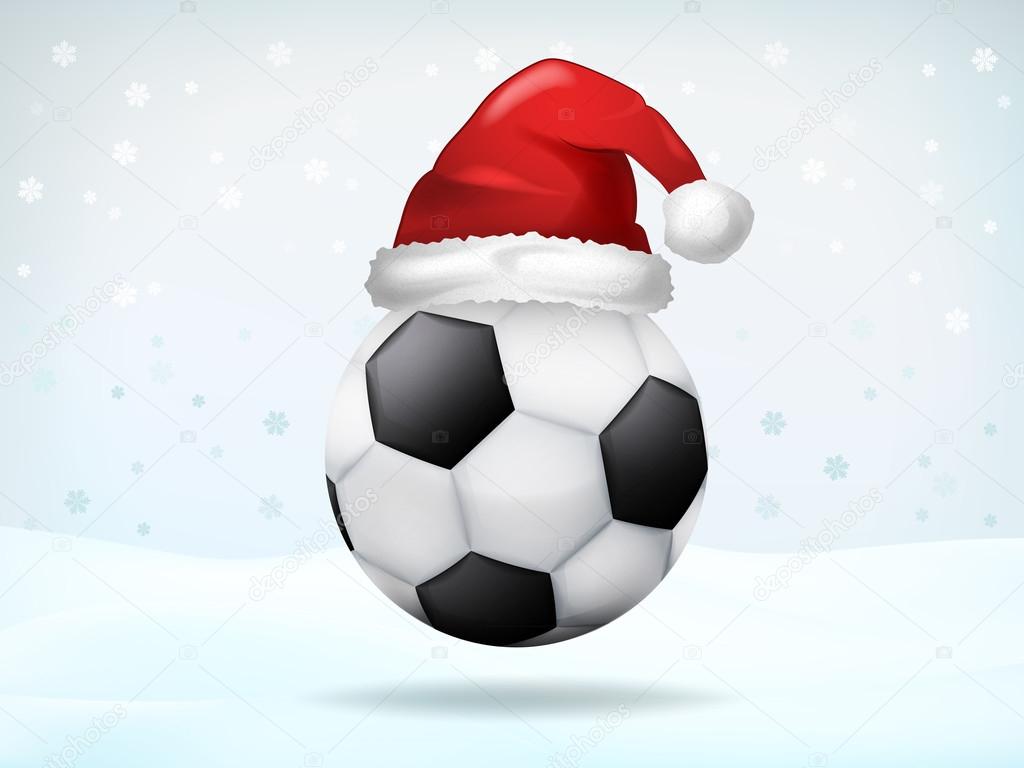 football ball covered with Santa cap 