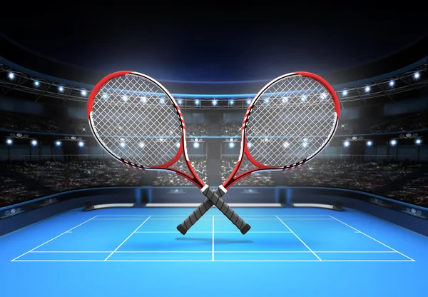 Raquetes de tênis vermelho e branco colocados sobre uma quadra azul — Fotografia de Stock