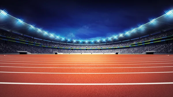 Estadio de atletismo con pista en vista panorámica nocturna —  Fotos de Stock