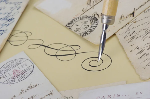 Old pen with postcards — Stock Photo, Image