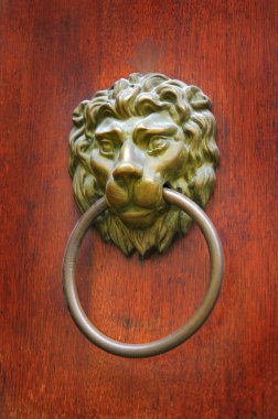 Old metal door knocker closeup